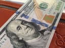 Купюра 100 долларов США — курс доллара к тенге за неделю